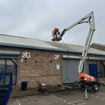 High-access exterior cleaning work at a commercial unit